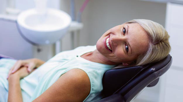 Woman sitting in the dentist chair